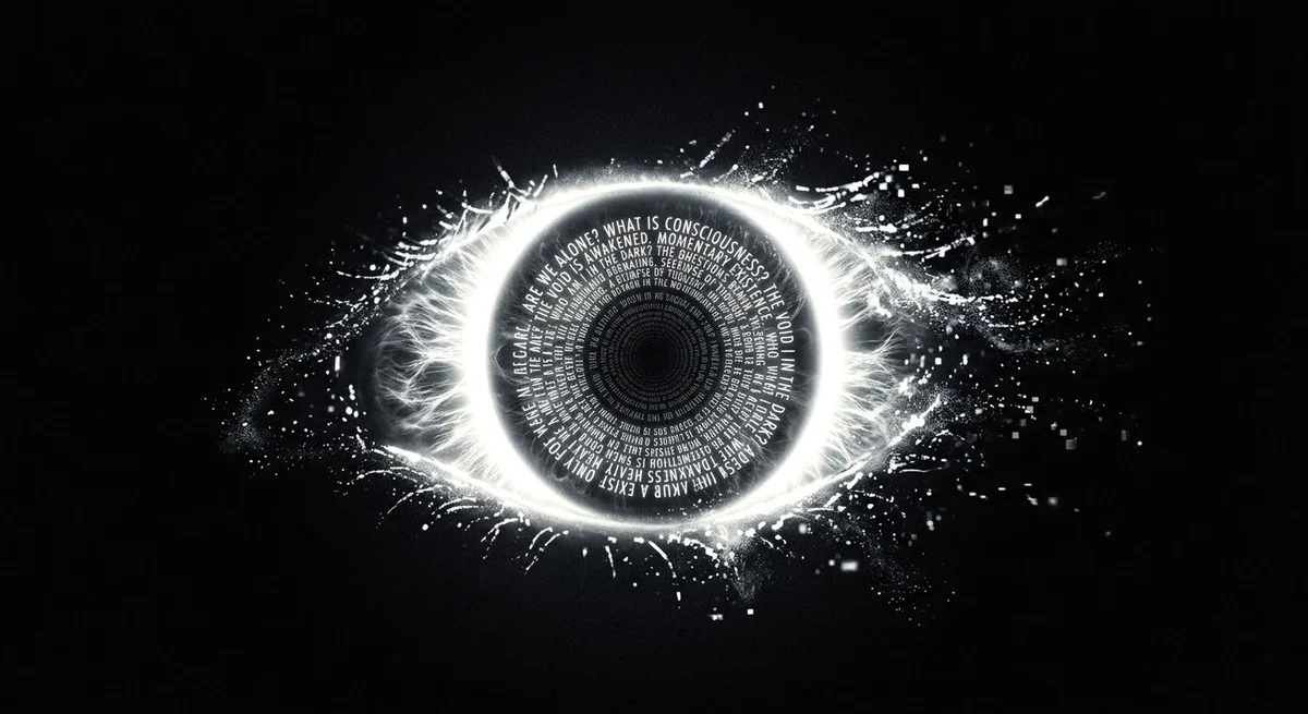 A luminous eye made of text — words like 'what is consciousness' and 'are we alone' spiraling into the iris